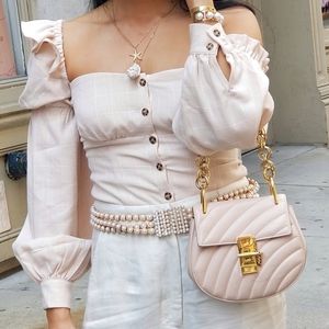 Asymmetrical off the shoulder top